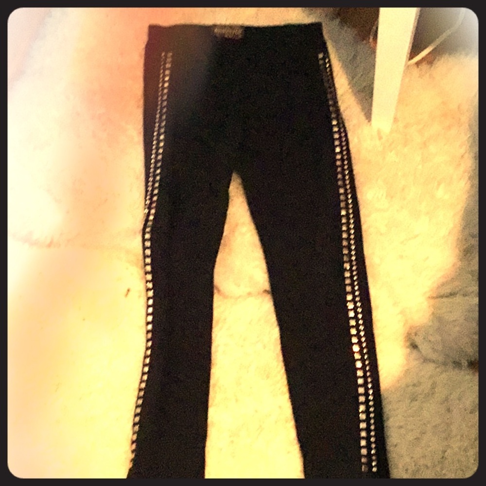 Kids leggings with rhinestones on the side.